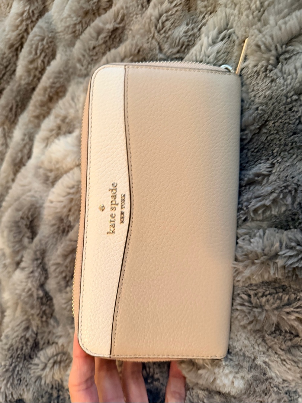 kate spade cream pebbled leather zip wallet with gold logo